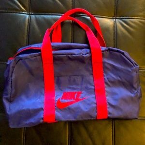 Purple and magenta vintage 80’s Nike duffel bag.
